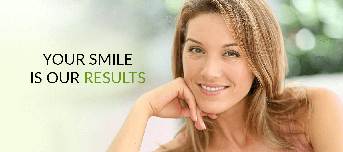 middle-aged woman smiling with text that says your smile is our results